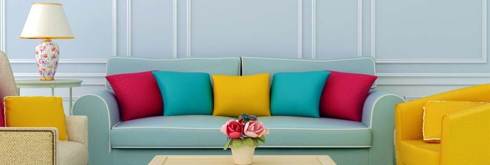 Teixits J. Marí Serra sofá con cojines de colores